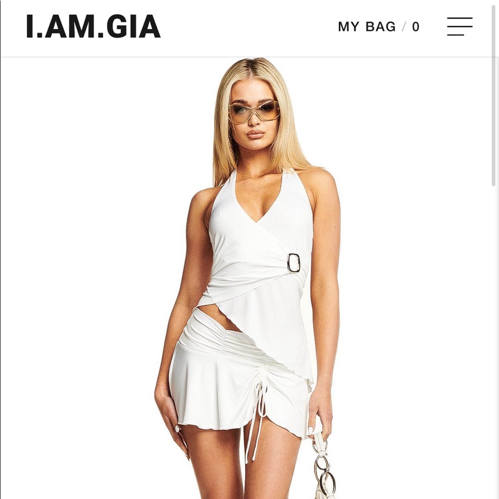 White mini skirt with plunging neckline halter set